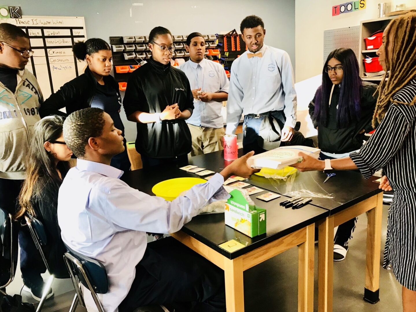 A group of people gathered around a table.